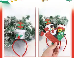 Detail of Christmas headband with sequined mini hat and holiday themed decor charms