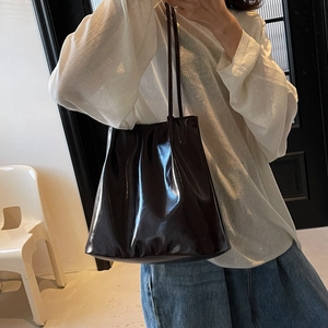 Minimalist large glossy leather tote bag with long double straps for women's daily commute