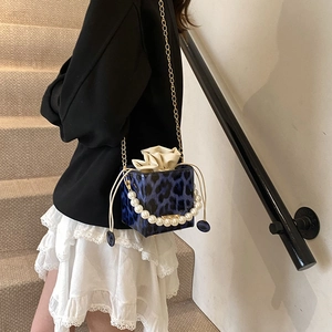 Blue leopard print bucket bag with pearl handle and golden chain strap for women