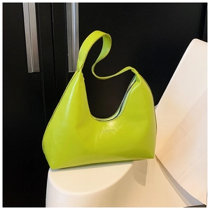 Detail of minimalist neon green crescent underarm bag with embossed JIASHEBING logo