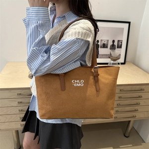 Retro large brown suede tote bag with leather straps and minimalist brand print