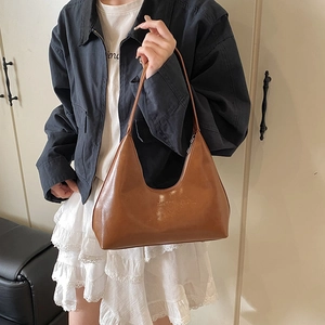 Minimalist brown PU leather crescent hobo bag for women with sleek shoulder strap