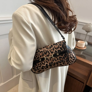 Retro leopard print underarm bag with gold horsebit buckle and slim black strap