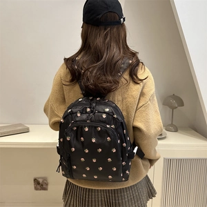 Sac à dos mode en nylon pour femmes avec motifs de fleurs de cerisier roses élégants