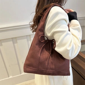 Retro dark brown suede tote bag for women with a side bow detail for casual commute style