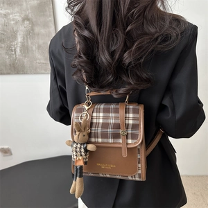 Vintage brown plaid leather backpack for women with cute plush rabbit pendant charm