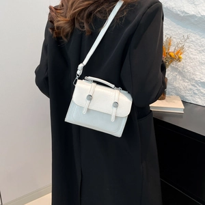 Retro white crossbody bag with cracked texture and silver metal buttons for women