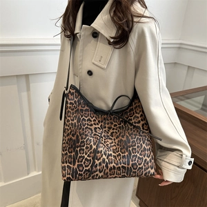 Classic leopard print tote bag with black leather straps for women's spring fashion
