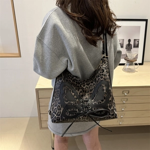 Fashionable leopard print shoulder tote bag with black butterfly patch and lace-up design