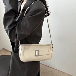 Minimalist beige PU leather crescent underarm bag with decorative silver buckle