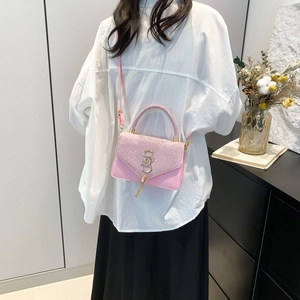 Pink sequin crossbody bag with gold metallic S pendant and stylish long tassel