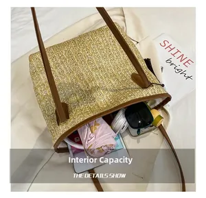 Large capacity woven straw tote bag interior showing space for umbrella and accessories