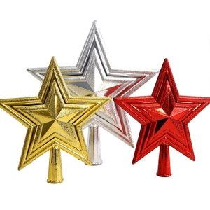 Three-dimensional Christmas star tree toppers in gold, silver, and red metallic finishes