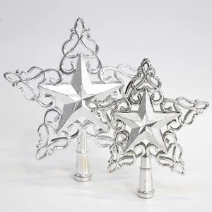 Silver glitter star tree topper with intricate filigree design for Christmas decor