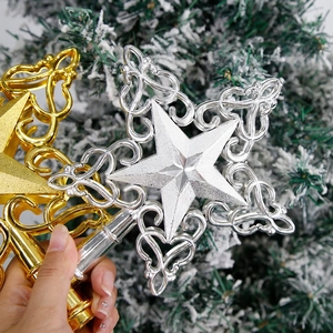 Golden and silver hollow star tree toppers for festive Christmas tree decorations
