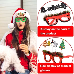 Detail view of festive Christmas party glasses with red frames and spring-mounted charms