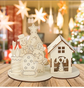 Detailed laser-cut wooden Christmas desktop decor featuring JOY cabin, elk and snowman