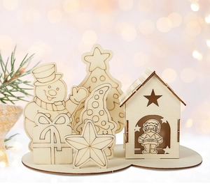 Detailed view of DIY wooden Christmas tabletop ornaments with reindeer and tree