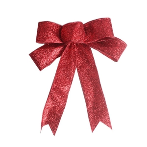 Gros plan d'un nœud de Noël rouge pailleté de 25cm avec texture scintillante pour sapin