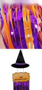 Macro detail of Halloween wizard hat door hanger with purple tinsel fringe and orange sign