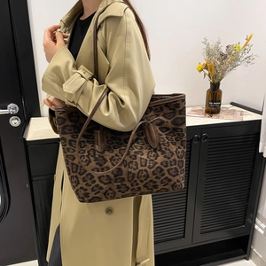 Trendy leopard print tote bag with brown leather handles for women's daily commute