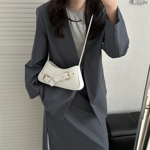 Minimalist white quilted half moon underarm bag with gold metal buckle and PU leather