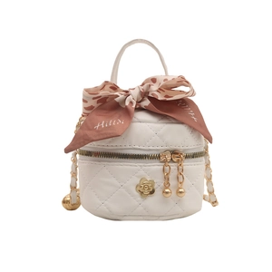 White quilted mini bucket bag with leopard print silk ribbon and gold chain strap