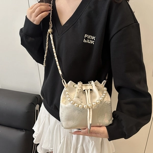 Elegant Chinese style bucket bag with floral patterns, pearl handle and chain strap