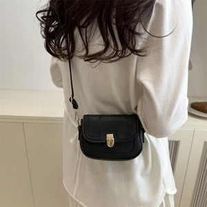 Retro black litchi pattern leather crossbody bag with gold hardware for women