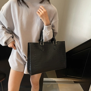 Fashionable black crocodile pattern tote bag with gold metal hardware for women