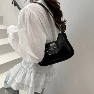 Minimalist black faux leather underarm shoulder bag for urban commute with fashion logo