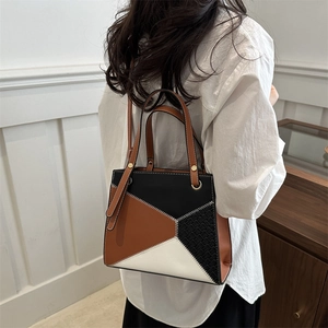 Fashionable color-block patchwork shoulder bag with woven texture and gold hardware details