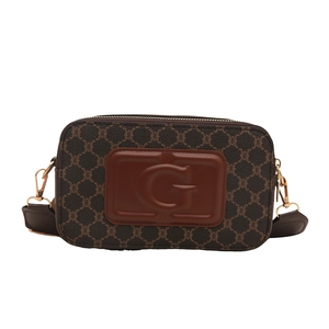 Sac bandoulière rétro monogramme marron avec logo G embossé et détails dorés