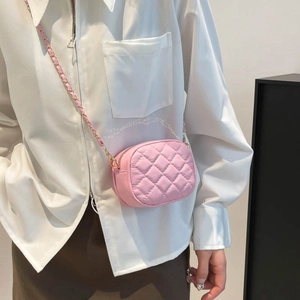 Quilted light pink mini crossbody bag with gold chain strap for women spring fashion