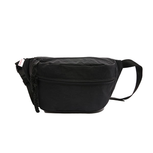 Minimalist black nylon crossbody bag with multi-zipper pockets and adjustable strap