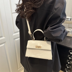 Chic beige crossbody bag with marble pattern texture and golden twist lock for women