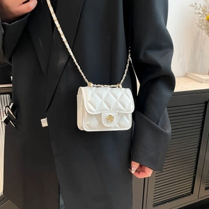 White quilted mini crossbody bag with camellia metal clasp and elegant chain strap