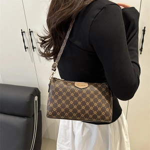 Classic brown monogram crossbody bag for women with adjustable leather shoulder strap