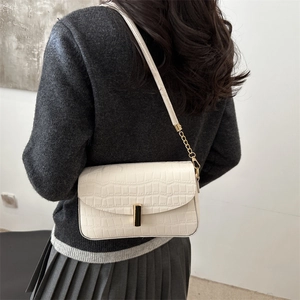 Chic white crocodile pattern shoulder bag with gold chain and metal buckle detail