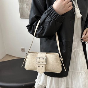 Retro cream faux crocodile underarm bag with oversized silver buckle and thin strap