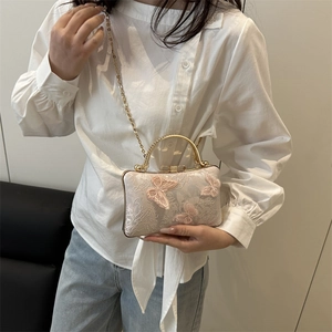 Elegant beige butterfly embroidery handbag with gold metal handle and chain strap
