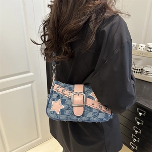 Y2K denim crossbody bag with pink leather stars and large metal buckle detail