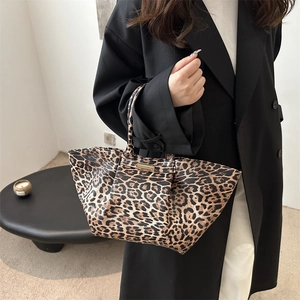 Chic leopard print oversized tote bag with gold metal plate detail for women