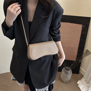 Chic beige crocodile textured baguette shoulder bag for women with flap and fashion text