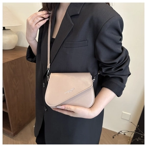 Detail showing high-quality PU leather texture and Fashion Trend text on beige square bag
