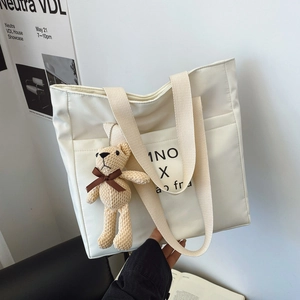 Minimalist Off White Fabric Tote Bag For Women With Bear Pendant Letter Printed Fashion Shoulder Bag Casual Everyday Handbag