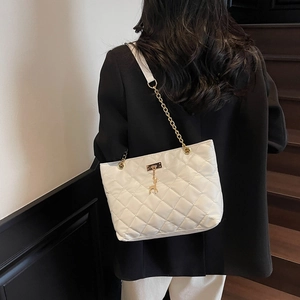 Fashionable white quilted tote bag with gold deer charm and chain strap for women