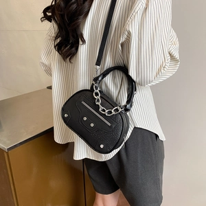 Black crocodile pattern shell crossbody bag with silver studs and chain handle
