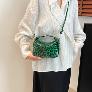 Chic green leopard print underarm bag with adjustable shoulder strap for women