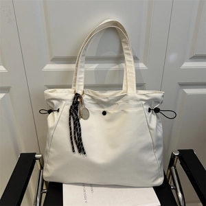 Women Large Capacity Nylon Tote Bag Lightweight Solid Color Shoulder Bag With Drawstring And Tennis Racket Charm For Daily Commute